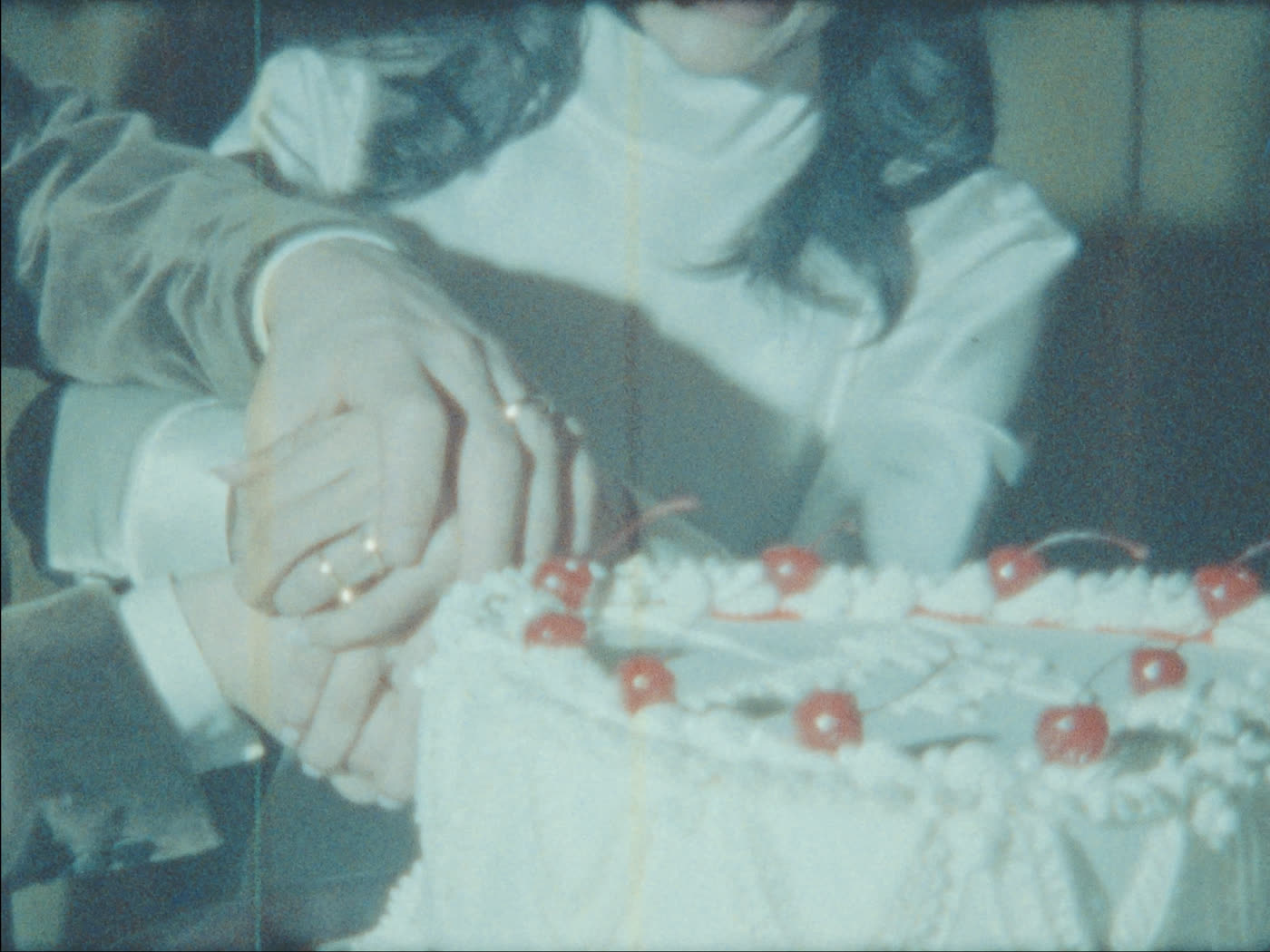 Hands cutting the wedding cake, Super 8 still