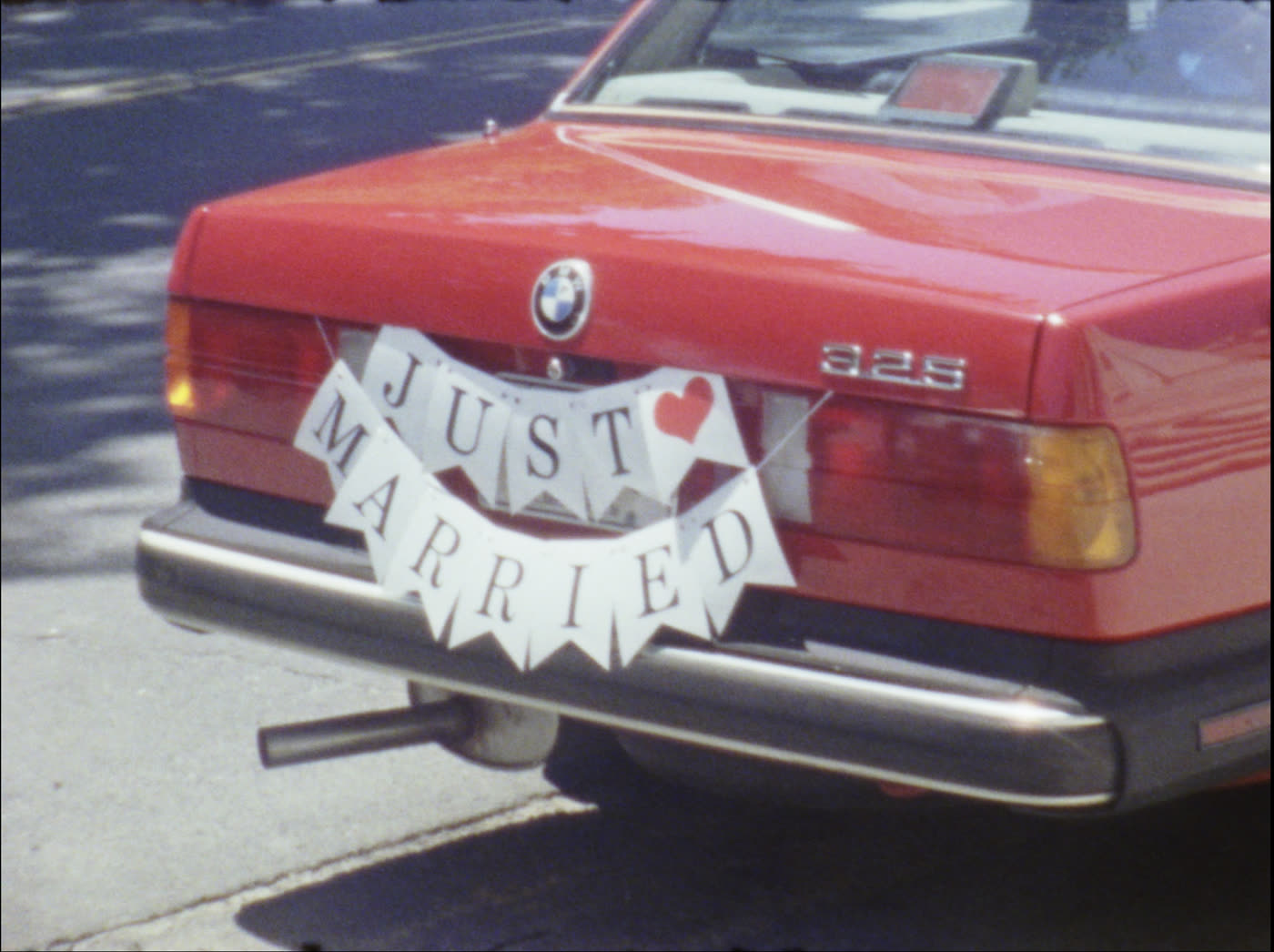 Just Married banner on the getaway car, Super 8 still